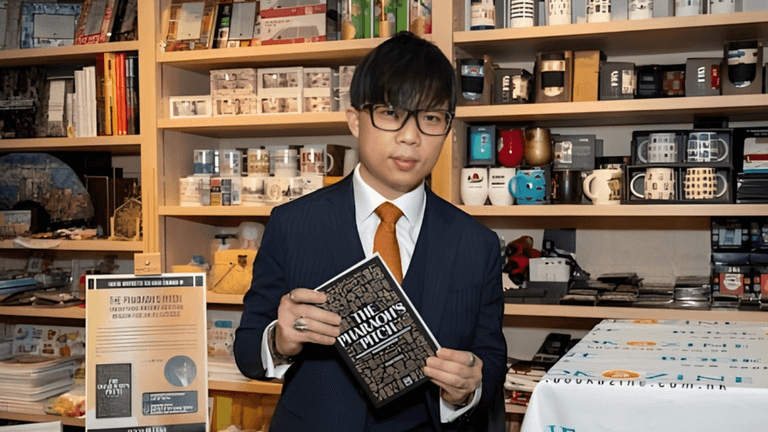 Ivan Yong reading from his book "Pandora’s Pivot" at a book event.