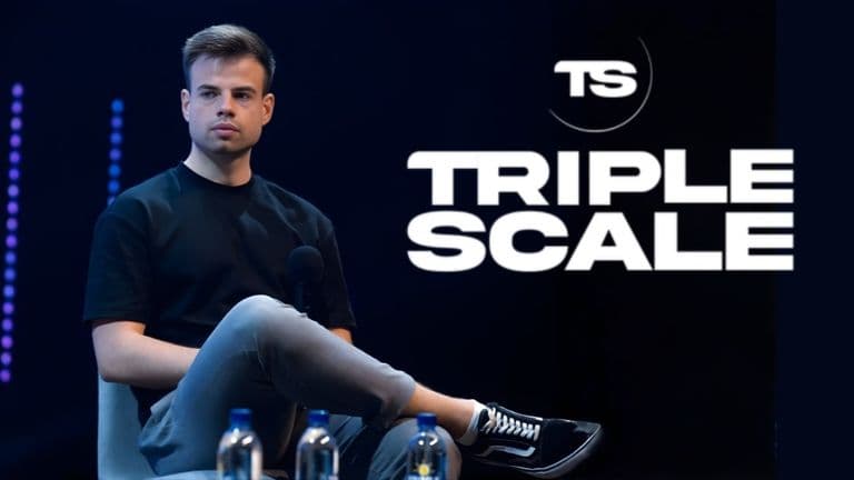 Deividas Tokaris, founder of Triple Scale, sitting with the brand logo 'TRIPLE SCALE' displayed next to him.