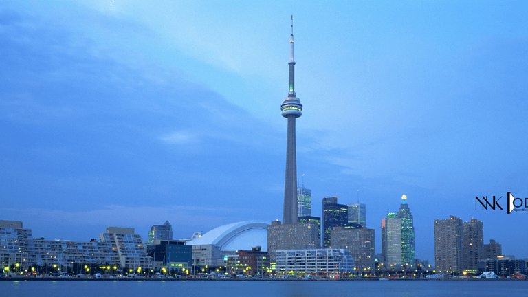"Toronto skyline with the CN Tower, symbolizing Open Door Collective™'s approach to real estate investment and strategic thinking."