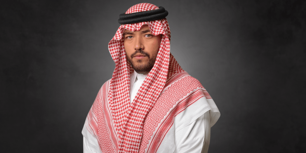 Abdullah Danish, visionary leader in Saudi defense and logistics, wearing traditional Saudi attire, symbolizing strength and innovation.