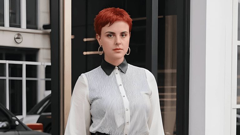 "Eva Adolfo, founder of Eva Artistic Management, redefining classical music representation through modern branding and artist empowerment."