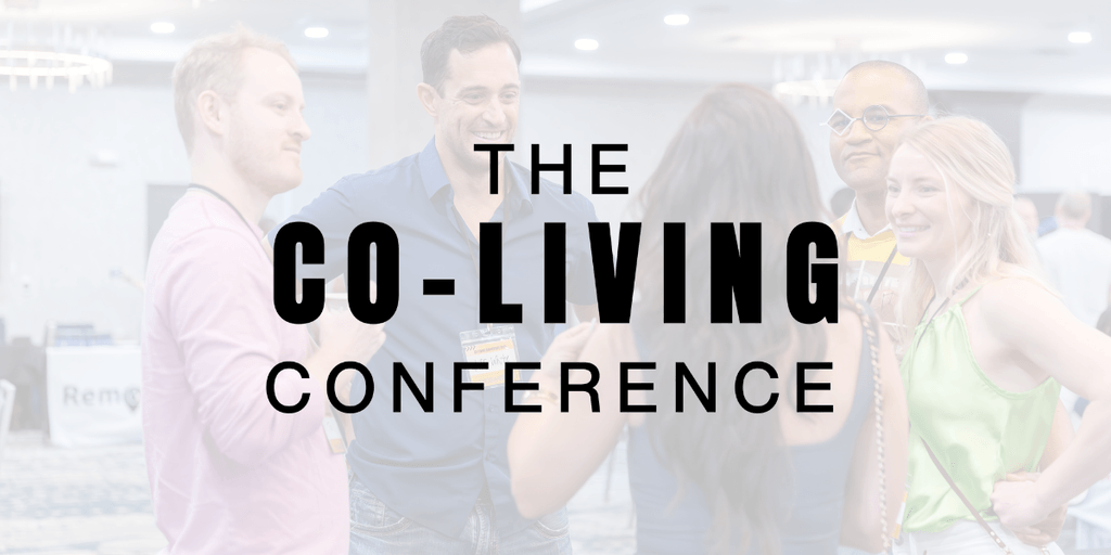 Real estate professionals and housing innovators networking at co-living conference, discussing affordable shared living solutions and community-focused residential development strategies.