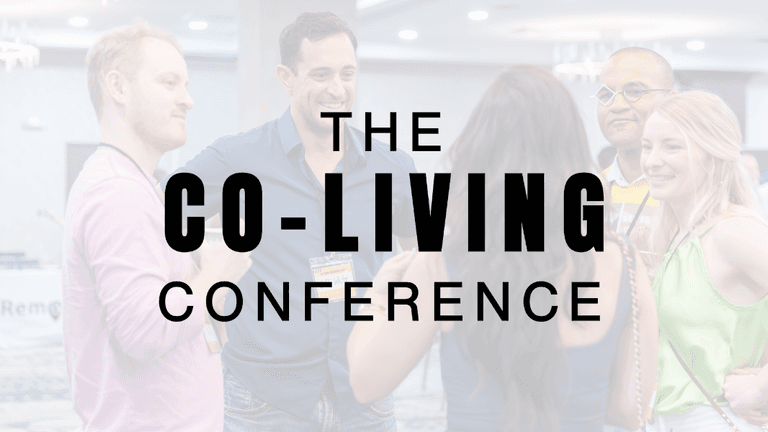 Real estate professionals and housing innovators networking at co-living conference, discussing affordable shared living solutions and community-focused residential development strategies.
