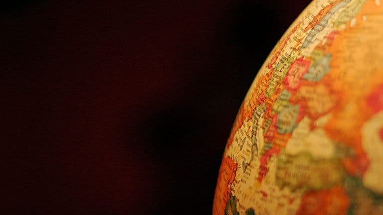 Economic Momentum Falters as Inflation and Global Tensions Mount