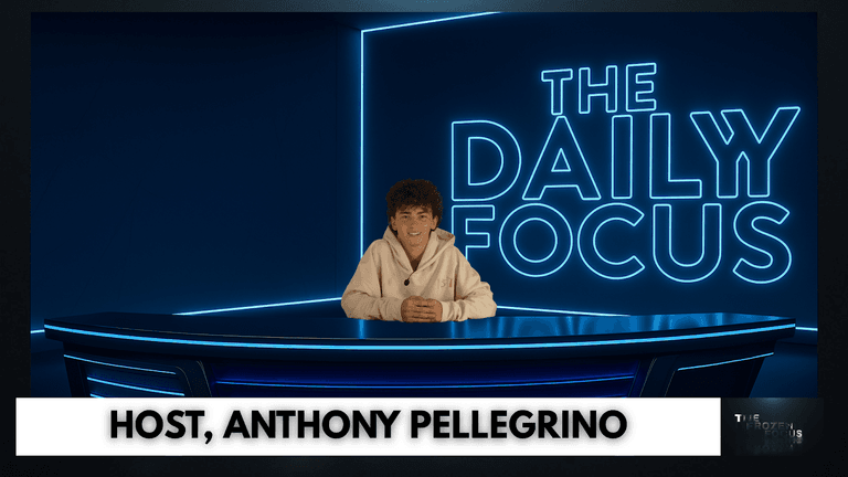 Host Anthony Pellegrino presenting on ‘The Daily Focus’ with neon blue set background and modern desk design.