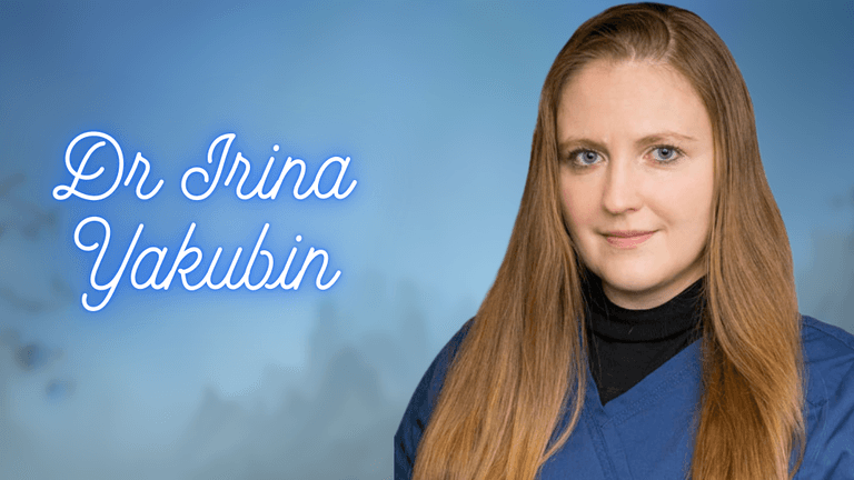 A portrait of Dr. Irina Yakubin, wearing medical scrubs, with a blurred blue background and her name written beside her.
