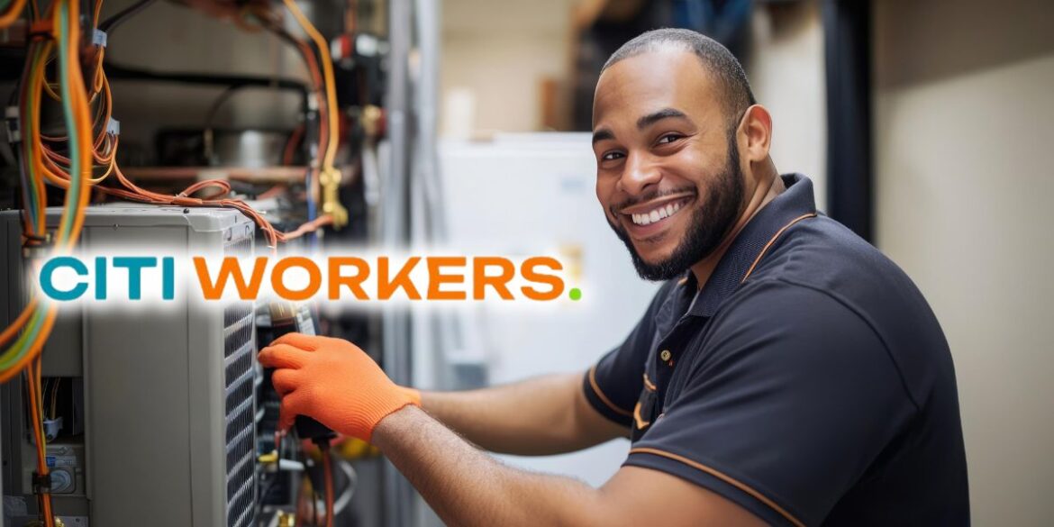 Smiling technician working on an air conditioning unit, wearing an orange glove, with the Citi Workers logo in the foreground, showcasing skilled tradespeople at work.