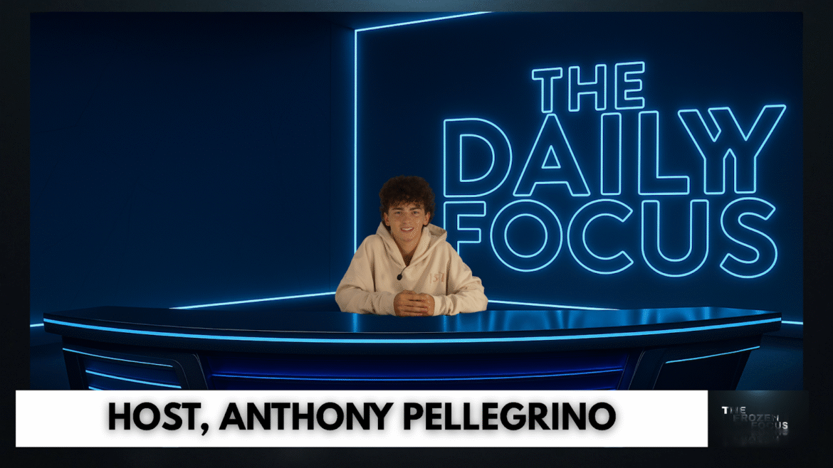 Host Anthony Pellegrino presenting on ‘The Daily Focus’ with neon blue set background and modern desk design.