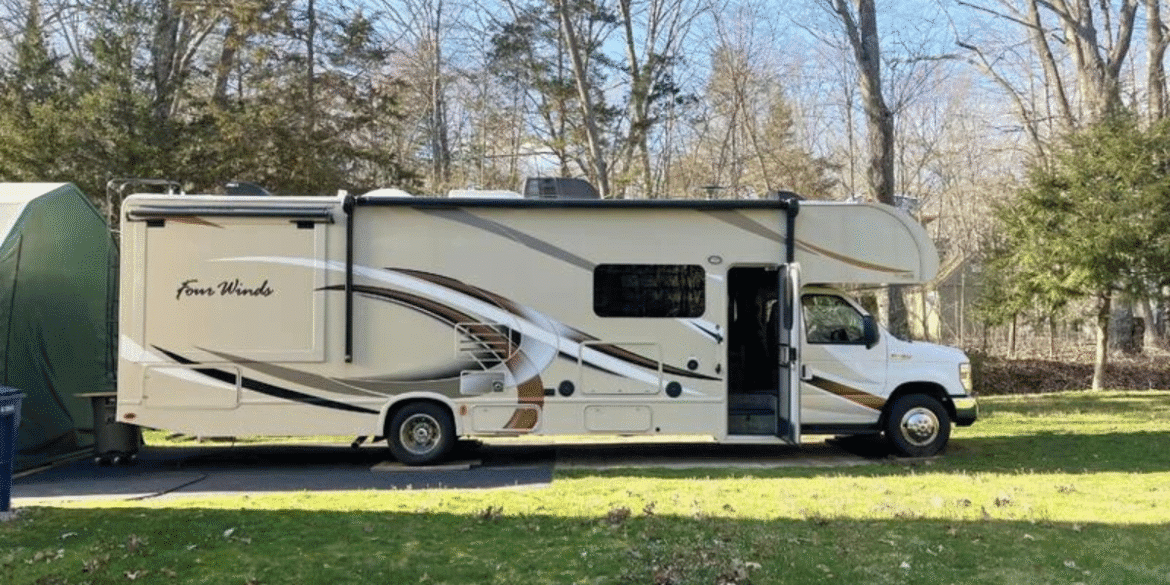 An RV in a scenic natural setting, symbolizing a digital detox and reconnection with nature.