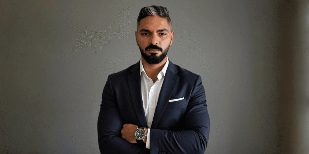 Saied Balajio, founder of Kenowt AI, in a professional suit, symbolizing leadership in transforming business automation globally.