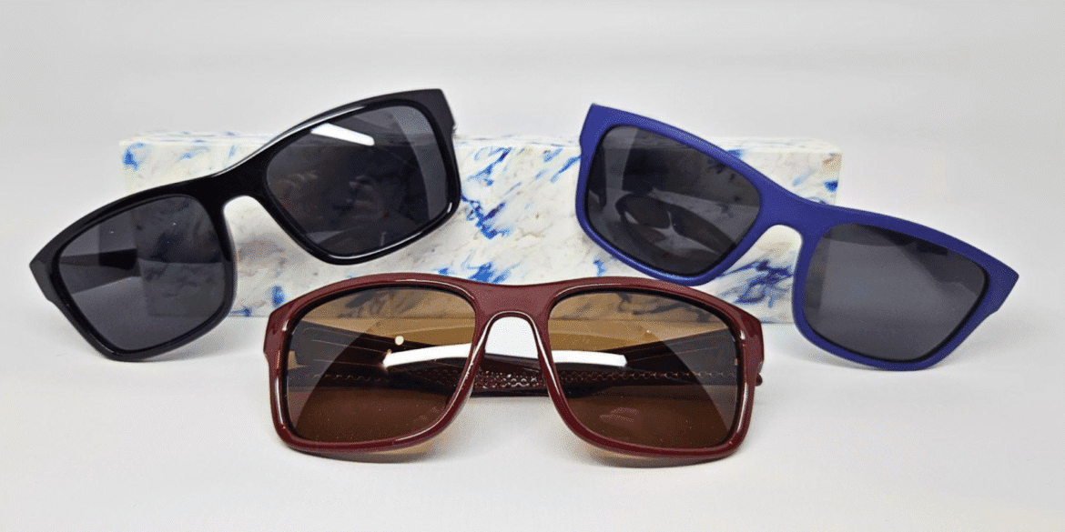The image features three pairs of stylish sunglasses, showcasing durability and design innovation inspired by Regenesis' sustainable materials.