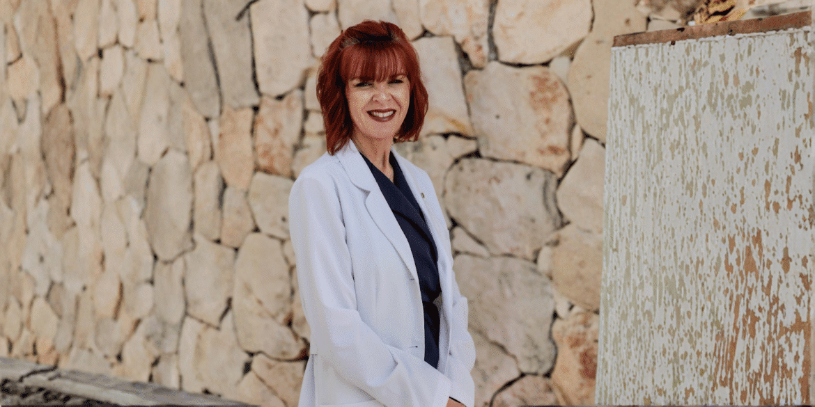 Kelly Fletcher, founder of Cascade Vitality Center, providing personalized functional medicine care focused on root-cause treatment for women's health challenges.