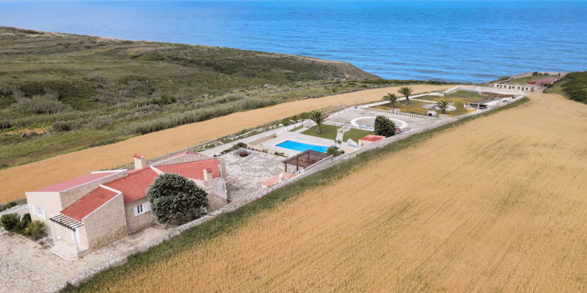 52 Atlantic Estate: A luxurious oceanfront property with expansive grounds, private pool, and serene views of the Atlantic Ocean.