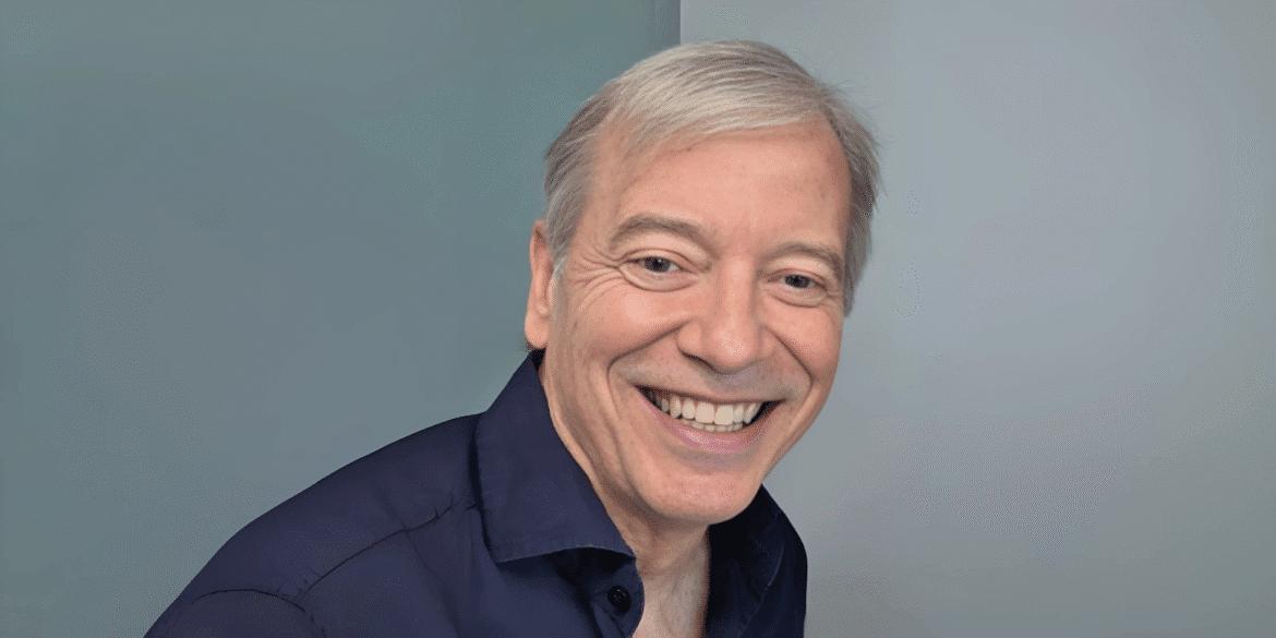 Eduardo M. Arroyo, founder of Arroyo & Associates, smiling confidently in a professional shirt, embodying leadership and innovation.