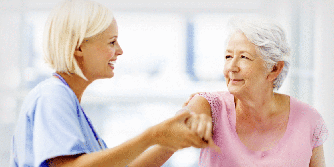 ChatGPT said: "Dr. Spyridon Chakalos, a chiropractor, smiling with a patient, representing his compassionate, holistic approach to healing and care."