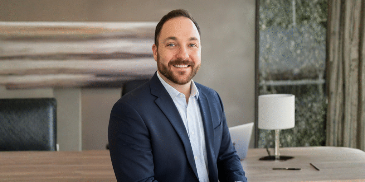 Professional headshot of Sean Barrite in a business setting, reflecting leadership and success.