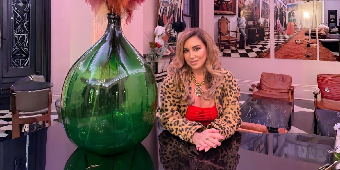 Maria Micha, a spiritual psychotherapist and healer, surrounded by elegant decor, symbolizing her transformative work.