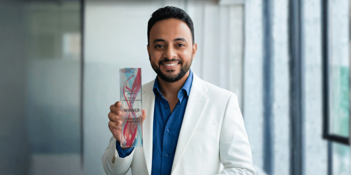 Mostafa Shaban, founder of XLR8 WELLNESS, holding the Business Transformation Award, highlighting leadership in longevity and wellness innovation.