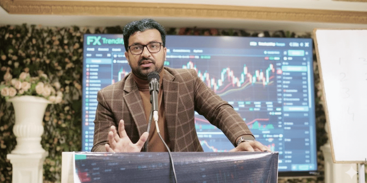 Malik Umar Awan speaking at a forex trading seminar, with AI trading data displayed behind him.