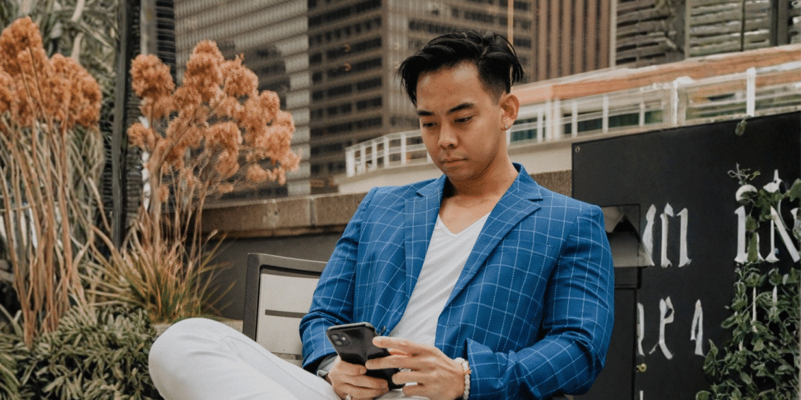 Fritz Colcol creating content in workspace, showcasing personal branding, digital marketing strategy, and scalable influence within modern entrepreneurship landscape.