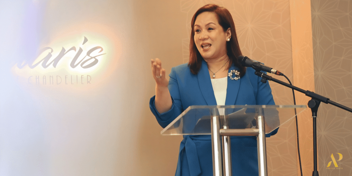 Sharon P. Fabian speaking at a Themes & Motifs wedding industry event.
