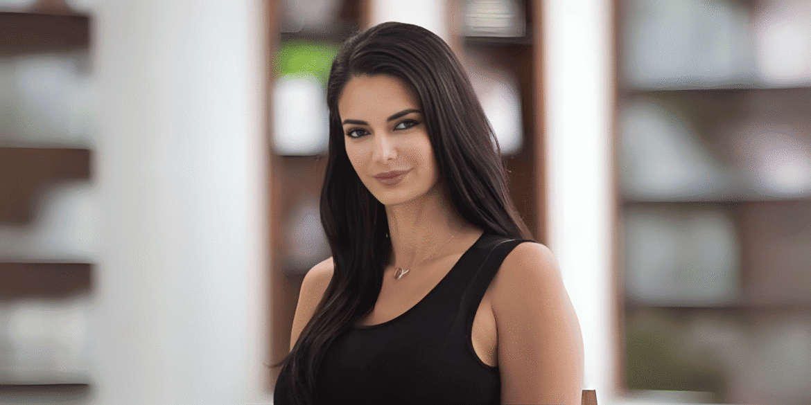 Setareh Motamedi wearing a black sleeveless top in a professional indoor portrait