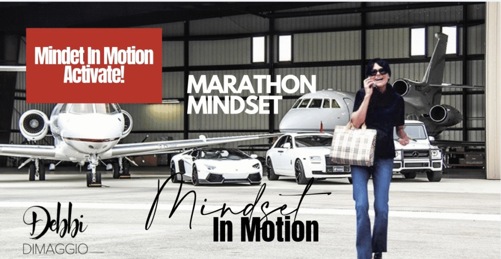 Debbi DiMaggio walks outside an aircraft hangar with private jets and luxury vehicles behind her.